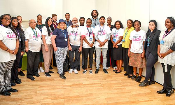 Memebers of the ARC Hounslow team, winners of the Team of the Year award at the RCN Nursing Awards 2023, standing in a semi-circle