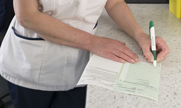 Nurse_writing_prescription_tile_SPL.jpg