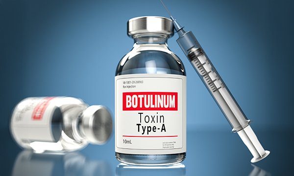 A vial of Botox with needle