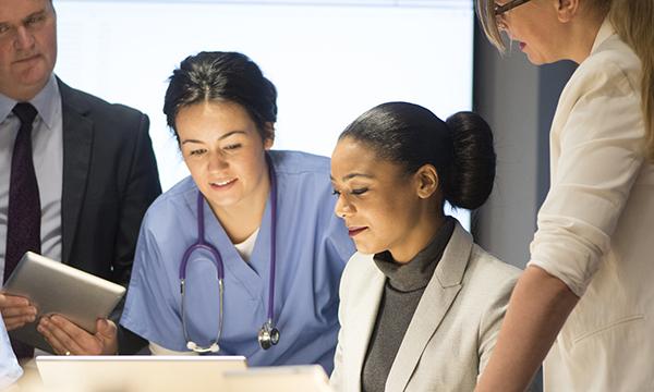 nurse in boardroom 