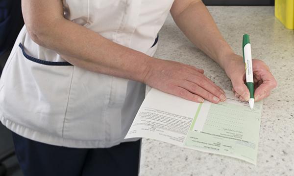 Nurse_writing_prescription_tile_SPL.jpg